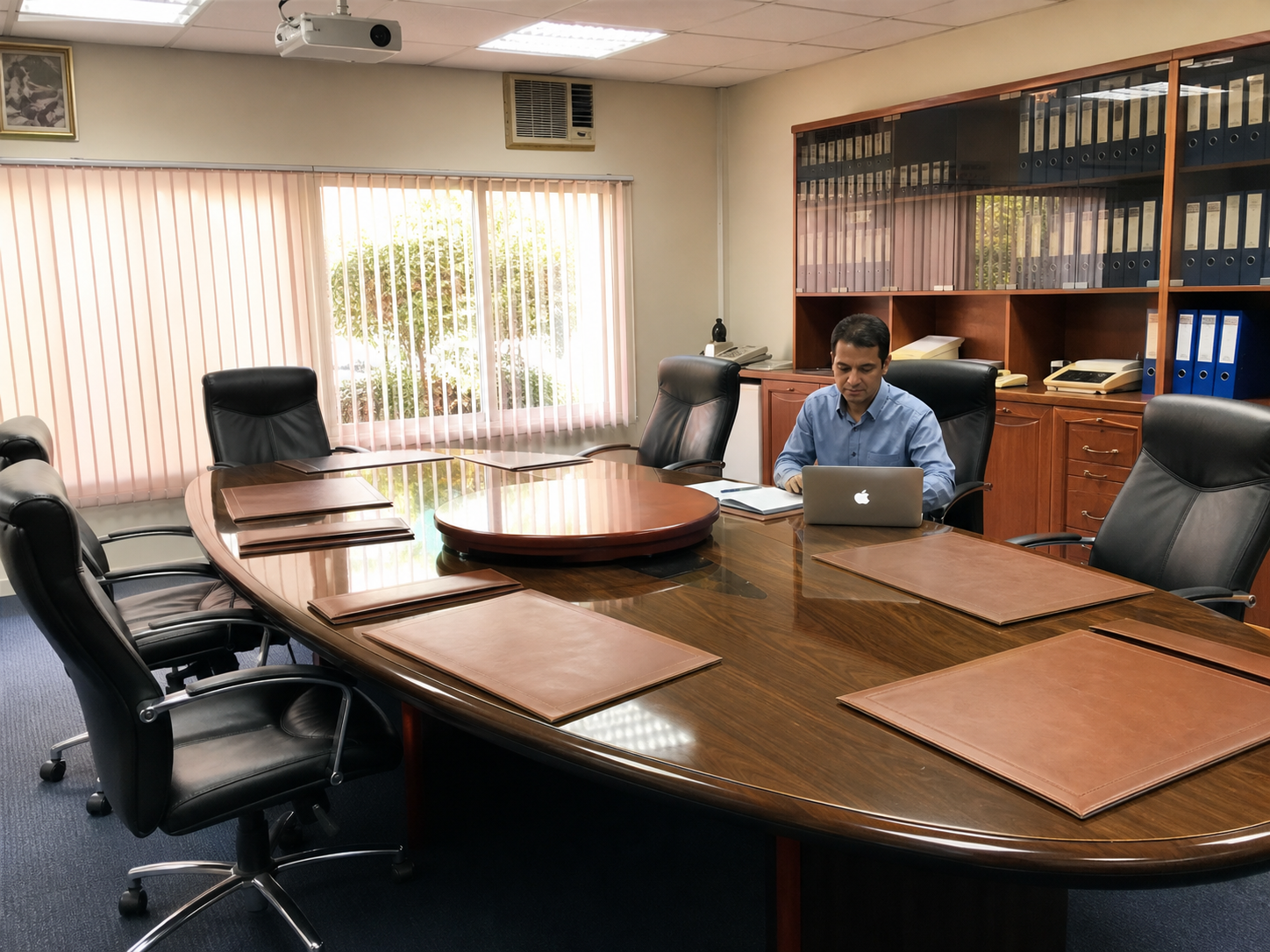 Axon consultant working in an office meeting room